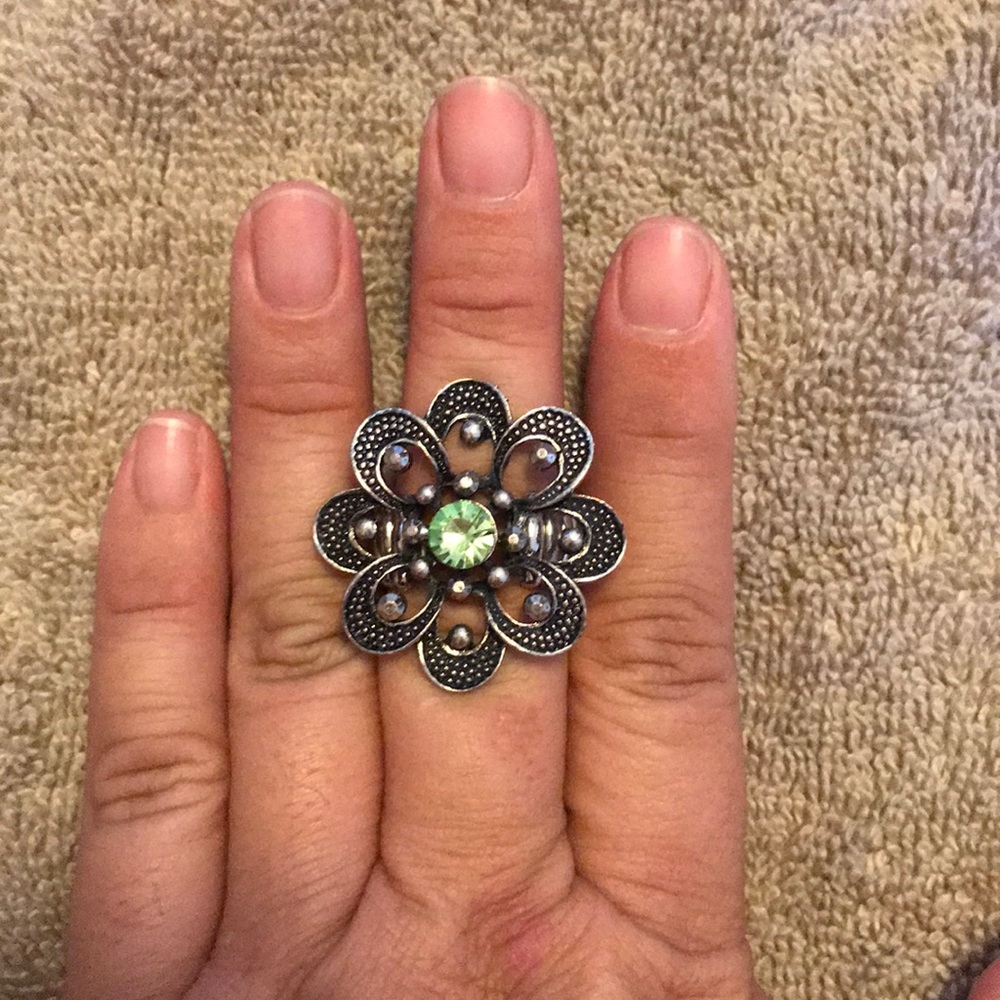 Green studded flower